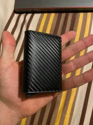 Testimonial image of Safe Track Wallet in hand